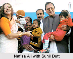 Union Minister of Youth Affairs and Sports Sunil Dutt, Union Minister of Health & Family Welfare A Ramdoss and socialite Nafisa Ali with AIDS-afflicted children during the AIDS Awareness Run, held by the CII 